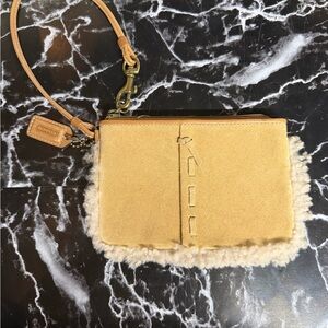 Coach tan Shearling Wristlet